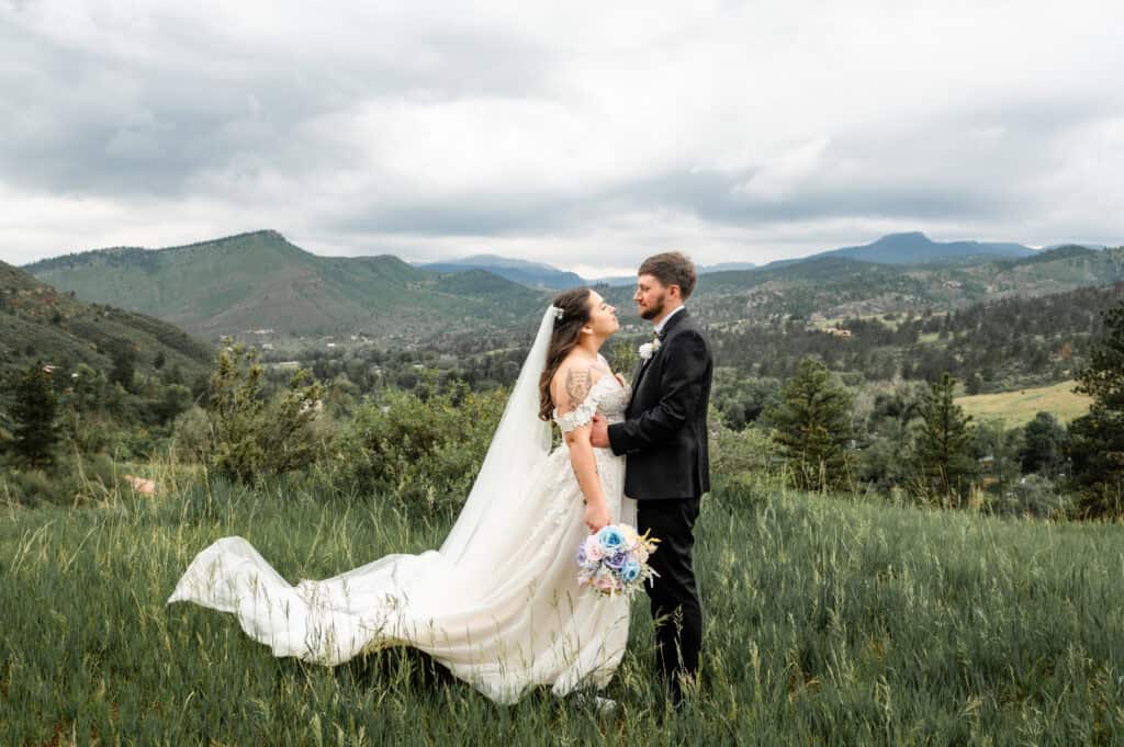 Mountain wedding with sweeping views June in the Colorado mountains? Sign us up every time. These two said “I do” with the Rockies as their witness.